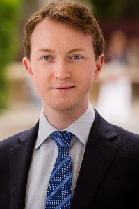 Fotografie a capului lui Alexander Breedon, asociat senior la Withers