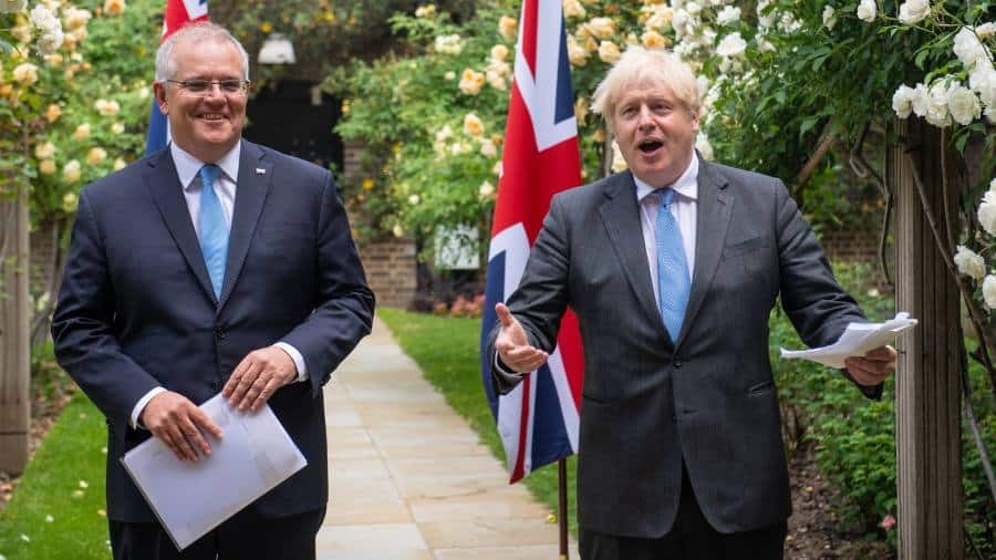 Guvernul britanic, amenințat cu acțiuni în justiție din cauza acordului comercial cu Australia