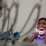 female patient scared during dental check up