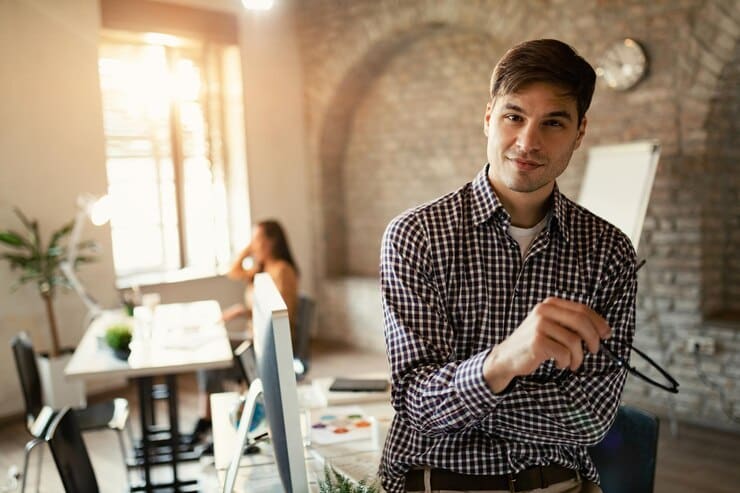 portrait confident entrepreneur standing office looking camera 637285 2744